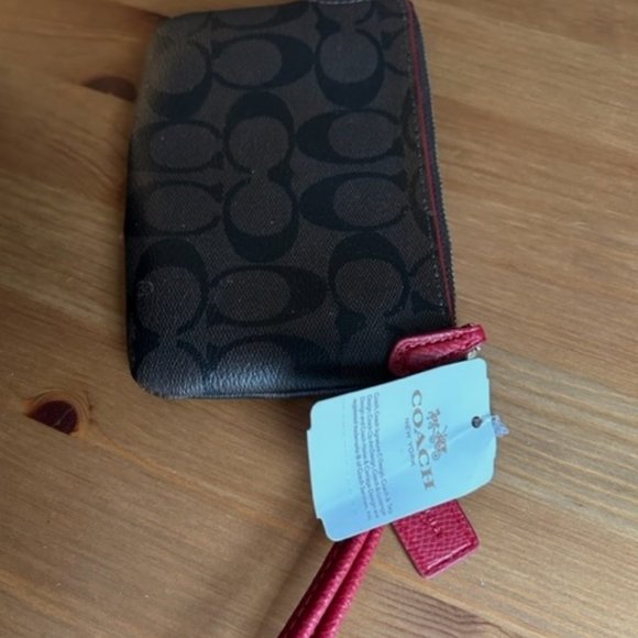 NWT Coach signature wristlet - Picture 2 of 3